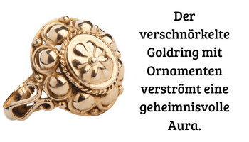 Vintage-Goldschmuck in Form eines mit Ornamenten verzierten Ringes.